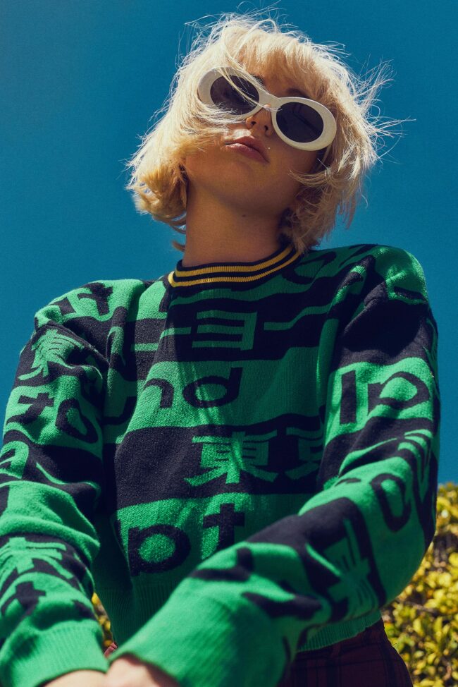 Model showcasing trendy sunglasses in an eyewear photography shoot, Lifestyle eyewear photography with a model in an urban setting, Fashionable eyewear campaign captured by a professional photographer, Model wearing designer glasses in a commercial eyewear photoshoot, Creative eyewear advertising photography featuring stylish models, High-fashion model posing with luxury eyewear, Eyewear photography emphasizing the elegance of optical fashion, Artistic shot of a model wearing chic eyeglasses, Close-up of model's face highlighting the eyewear in a lifestyle shoot, Dynamic eyewear photography for a modern advertising campaign