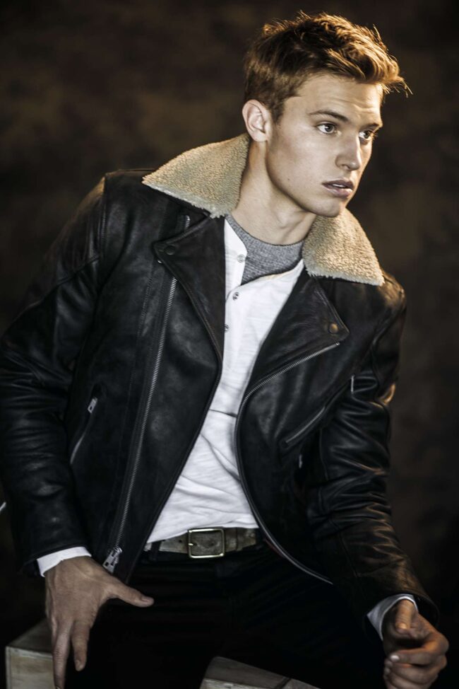 Aspiring male model reading up on 'how to become a male model', Young man working on his portfolio, a key step in how to become a male model, Fitness training for male models, integral to learning how to become a male model, Photo shoot focusing on style, essential for aspiring male models, Male model practicing runway techniques, a part of how to become a male model, Behind-the-scenes at a photo shoot with a budding male model, Casting call attendance, a crucial move in becoming a male model, Personal grooming tips for aspiring male models, Headshot session for a male model portfolio, an important step, Fashion industry networking, a vital aspect of how to become a male model