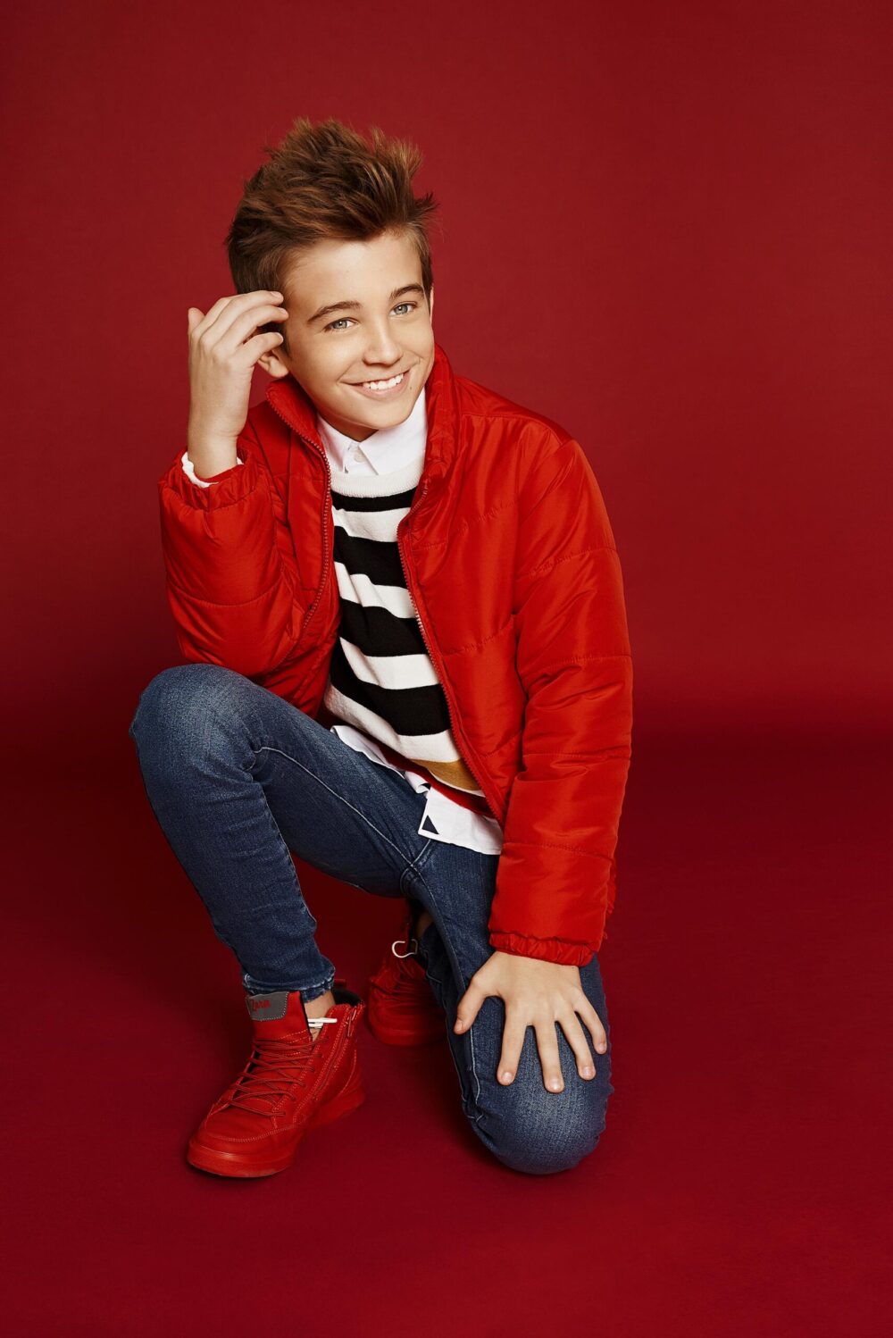 Aspiring model reading a guide on 'how to become a model', Photo session for a modeling portfolio, a step in learning how to become a model, New face at a modeling agency, following tips on how to become a model, Fashion shoot, part of the process in how to become a model, Model in training practicing runway walk, essential for how to become a model, Behind-the-scenes look at a model's preparation, key to becoming a model, Aspiring model attending a casting call, a step towards becoming a model, Fitness regime for models, an aspect of how to become a model, Portfolio review, a crucial phase in how to become a model, Model receiving coaching on posing techniques, important for aspiring models