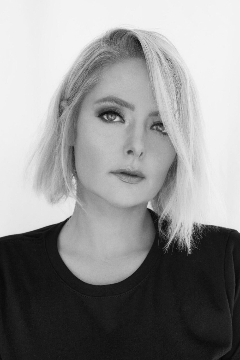 Aspiring model reading a guide on 'how to become a model', Photo session for a modeling portfolio, a step in learning how to become a model, New face at a modeling agency, following tips on how to become a model, Fashion shoot, part of the process in how to become a model, Model in training practicing runway walk, essential for how to become a model, Behind-the-scenes look at a model's preparation, key to becoming a model, Aspiring model attending a casting call, a step towards becoming a model, Fitness regime for models, an aspect of how to become a model, Portfolio review, a crucial phase in how to become a model, Model receiving coaching on posing techniques, important for aspiring models