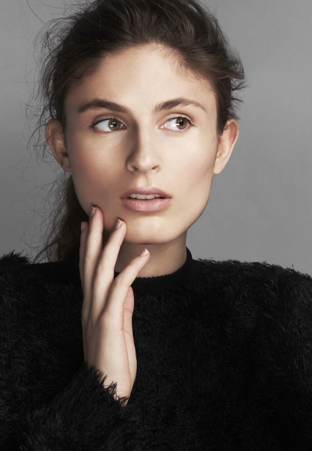 Aspiring model reading a guide on 'how to become a model', Photo session for a modeling portfolio, a step in learning how to become a model, New face at a modeling agency, following tips on how to become a model, Fashion shoot, part of the process in how to become a model, Model in training practicing runway walk, essential for how to become a model, Behind-the-scenes look at a model's preparation, key to becoming a model, Aspiring model attending a casting call, a step towards becoming a model, Fitness regime for models, an aspect of how to become a model, Portfolio review, a crucial phase in how to become a model, Model receiving coaching on posing techniques, important for aspiring models