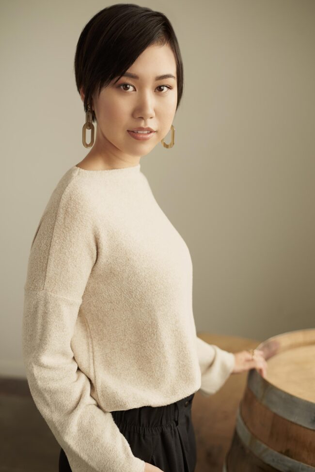 Aspiring model reading a guide on 'how to become a model', Photo session for a modeling portfolio, a step in learning how to become a model, New face at a modeling agency, following tips on how to become a model, Fashion shoot, part of the process in how to become a model, Model in training practicing runway walk, essential for how to become a model, Behind-the-scenes look at a model's preparation, key to becoming a model, Aspiring model attending a casting call, a step towards becoming a model, Fitness regime for models, an aspect of how to become a model, Portfolio review, a crucial phase in how to become a model, Model receiving coaching on posing techniques, important for aspiring models