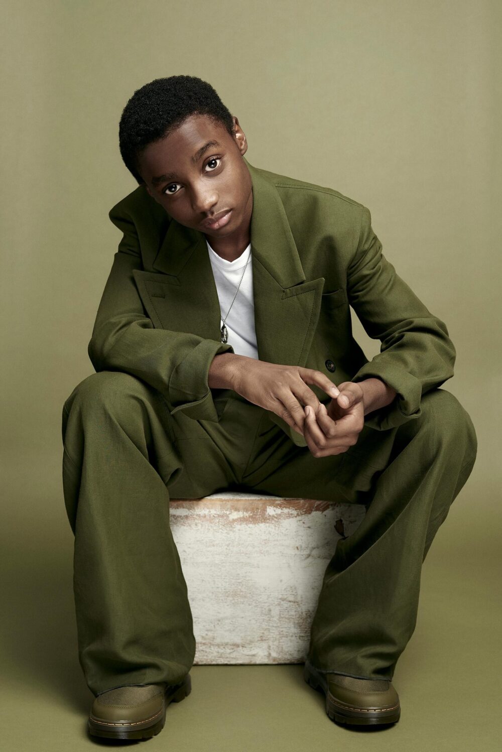 Aspiring model reading a guide on 'how to become a model', Photo session for a modeling portfolio, a step in learning how to become a model, New face at a modeling agency, following tips on how to become a model, Fashion shoot, part of the process in how to become a model, Model in training practicing runway walk, essential for how to become a model, Behind-the-scenes look at a model's preparation, key to becoming a model, Aspiring model attending a casting call, a step towards becoming a model, Fitness regime for models, an aspect of how to become a model, Portfolio review, a crucial phase in how to become a model, Model receiving coaching on posing techniques, important for aspiring models