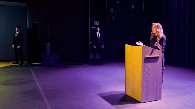 Security team in action captured in a lifestyle photography session, Professional security guard on duty in a lifestyle photo shoot, Lifestyle photography depicting a security briefing for an event, Security personnel patrolling a shopping center in a lifestyle image, Close-up lifestyle shot of security communication equipment in use, Security guards ensuring safety at a private event, captured in lifestyle photos, Lifestyle image of a security professional escorting a client, Security team coordination captured in a dynamic lifestyle photograph, Vigilant security presence at a public gathering, Lifestyle photography showcasing a security company's commitment to safety