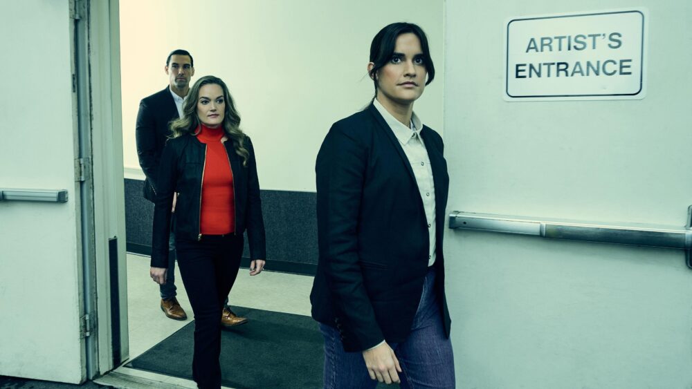 Security team in action captured in a lifestyle photography session, Professional security guard on duty in a lifestyle photo shoot, Lifestyle photography depicting a security briefing for an event, Security personnel patrolling a shopping center in a lifestyle image, Close-up lifestyle shot of security communication equipment in use, Security guards ensuring safety at a private event, captured in lifestyle photos, Lifestyle image of a security professional escorting a client, Security team coordination captured in a dynamic lifestyle photograph, Vigilant security presence at a public gathering, Lifestyle photography showcasing a security company's commitment to safety