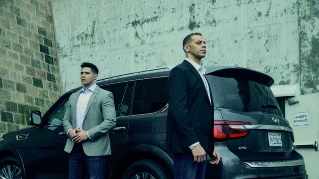 Security team in action captured in a lifestyle photography session, Professional security guard on duty in a lifestyle photo shoot, Lifestyle photography depicting a security briefing for an event, Security personnel patrolling a shopping center in a lifestyle image, Close-up lifestyle shot of security communication equipment in use, Security guards ensuring safety at a private event, captured in lifestyle photos, Lifestyle image of a security professional escorting a client, Security team coordination captured in a dynamic lifestyle photograph, Vigilant security presence at a public gathering, Lifestyle photography showcasing a security company's commitment to safety