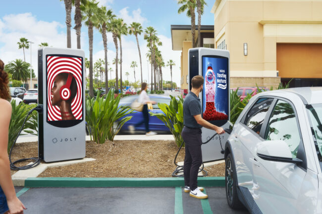 ev charging station lifestyle photography, electric vehicle charging lifestyle photography, commercial photography for ev charging brands, lifestyle photos of drivers using ev charging stations, branded ev charger campaign photography, public charging station lifestyle images, home ev charger lifestyle photography, workplace ev charging photography, electric car charging brand photography, clean energy lifestyle campaign photos, ev infrastructure commercial photography, modern charging station product and lifestyle photography, real-world ev charging customer photography, advertising photography for electric vehicle charging companies, sustainable transportation lifestyle photography, electric mobility campaign photography, ev charger installation lifestyle images, driver using electric vehicle charger photography, commercial lifestyle photos for clean tech brands, ev charging station marketing photography