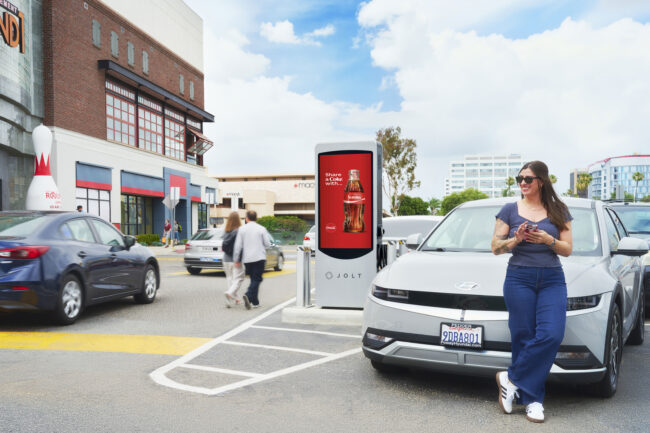 ev charging station lifestyle photography, electric vehicle charging lifestyle photography, commercial photography for ev charging brands, lifestyle photos of drivers using ev charging stations, branded ev charger campaign photography, public charging station lifestyle images, home ev charger lifestyle photography, workplace ev charging photography, electric car charging brand photography, clean energy lifestyle campaign photos, ev infrastructure commercial photography, modern charging station product and lifestyle photography, real-world ev charging customer photography, advertising photography for electric vehicle charging companies, sustainable transportation lifestyle photography, electric mobility campaign photography, ev charger installation lifestyle images, driver using electric vehicle charger photography, commercial lifestyle photos for clean tech brands, ev charging station marketing photography