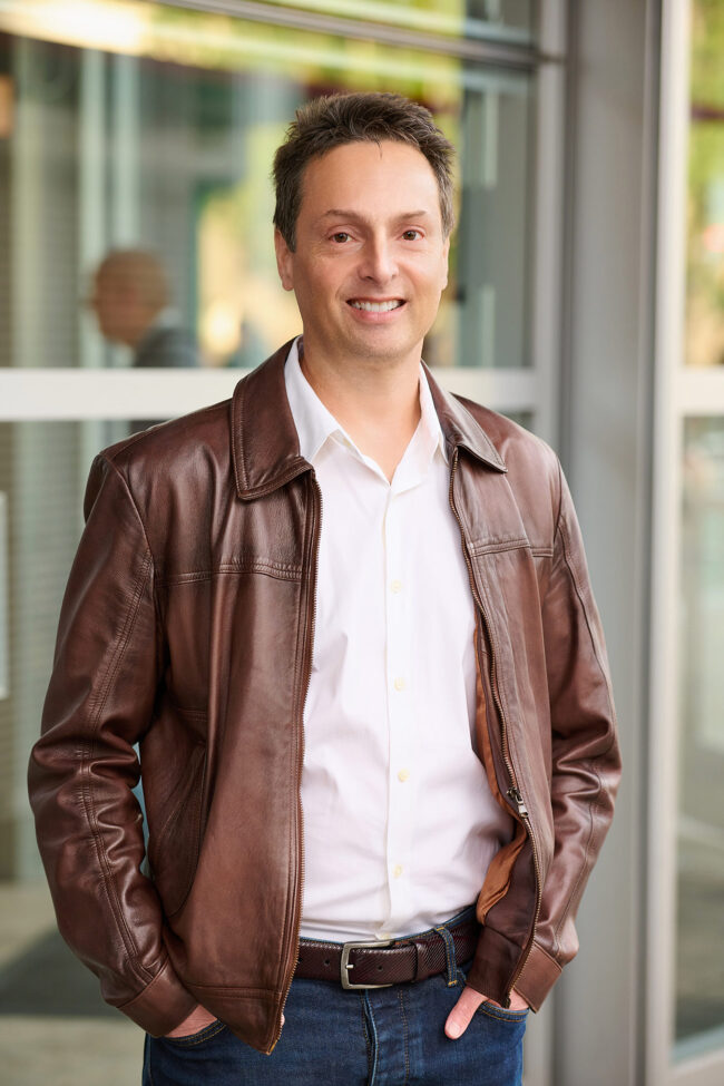 Social media photographer in Los Angeles, professional lifestyle portrait of a man in a leather jacket and white shirt, content photo for Instagram, websites, LinkedIn, and digital marketing.